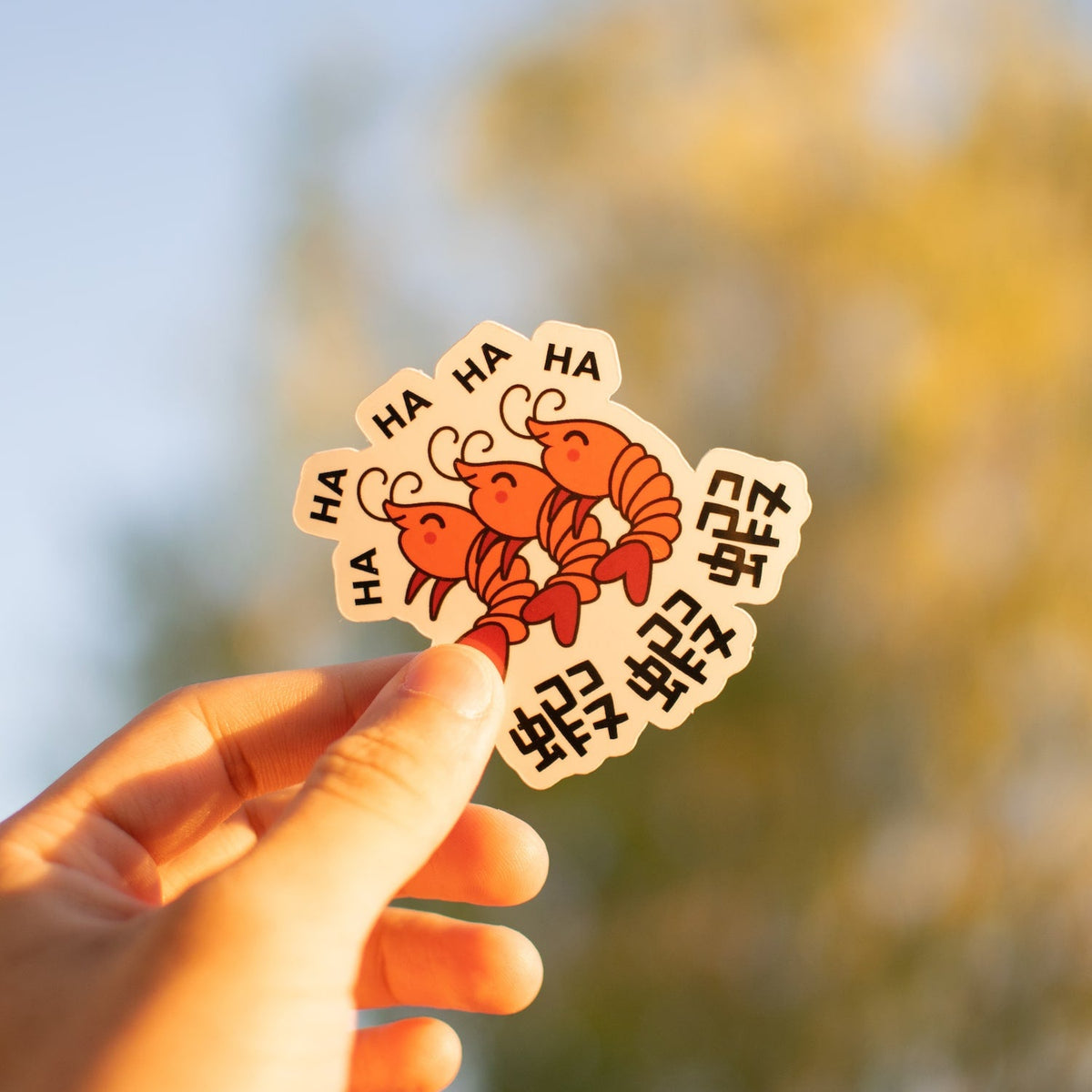 http://nidemama.com/cdn/shop/products/ha-ha-ha-shrimp-vinyl-sticker-sticker-745566_1200x1200.jpg?v=1666804781